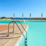 Апартаменты Marineledda Langolino Del Relax